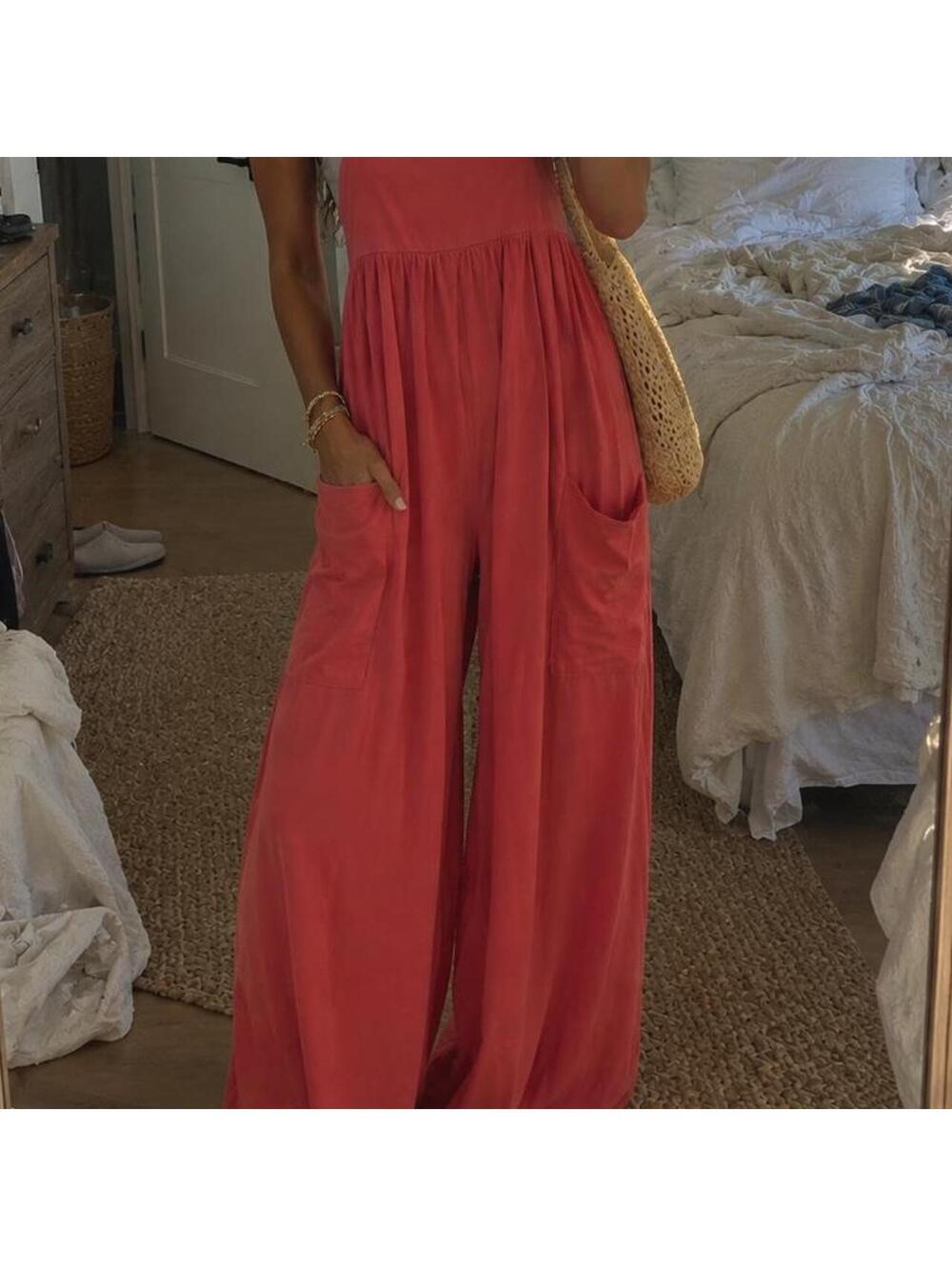 FP Movement Hot Shot Strappy Onesie by Free People in Grapefruit